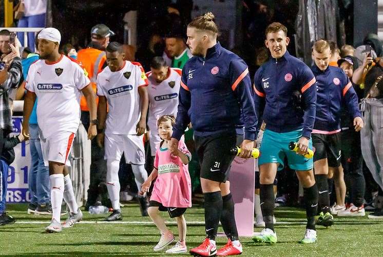 Nellie-Rose leads Nellie's Army out on to the pitch Picture: Helen Cooper
