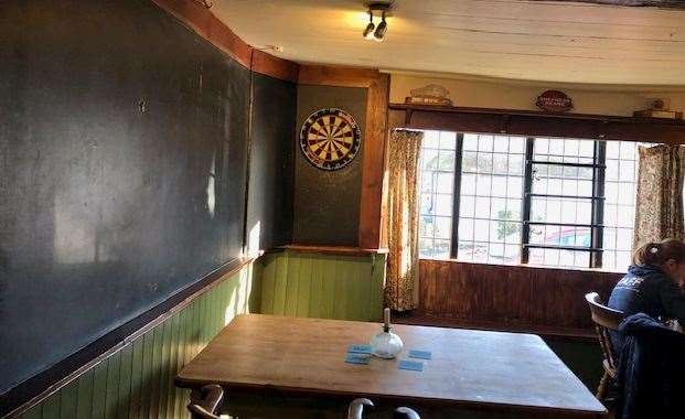 We didn't have a game, but there was a dartboard on the left hand side of the bar, complete with the largest marking blackboard I've ever seen