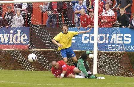 CLOSE THING: Welling's Che Stadhart (on ground) is thwarted by keeper Delroy Preddie during the Wings' 5-1 victory over Yeading. Picture: NICK JOHNSON