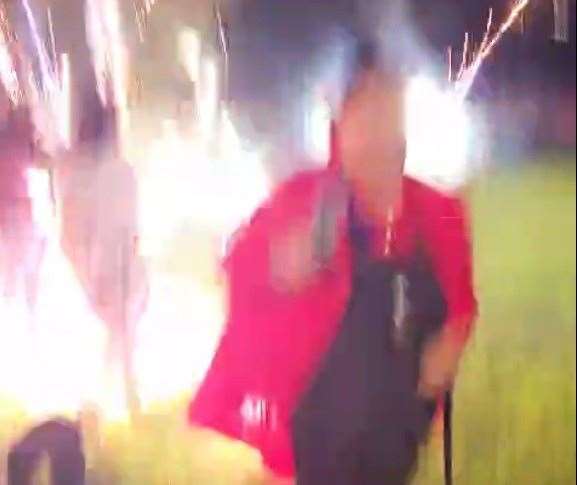 Fireworks can be seen exploding at the feet of two people as a display at The Coppice in Eastchurch, Sheppey, went wrong