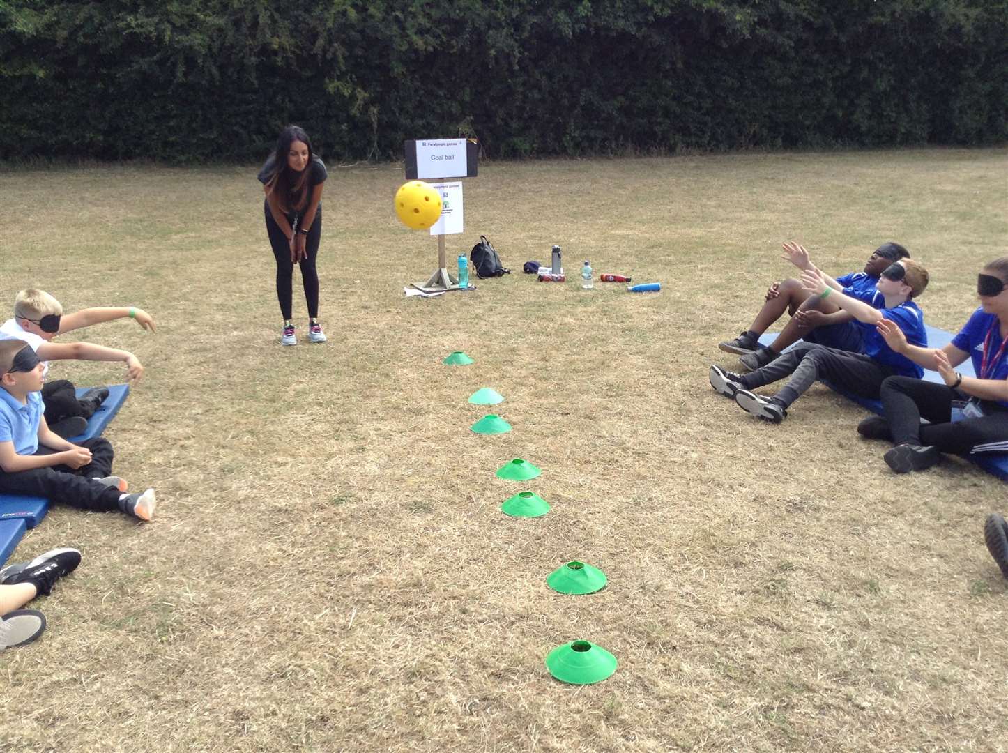 Youngsters playing goalball with blindfolds