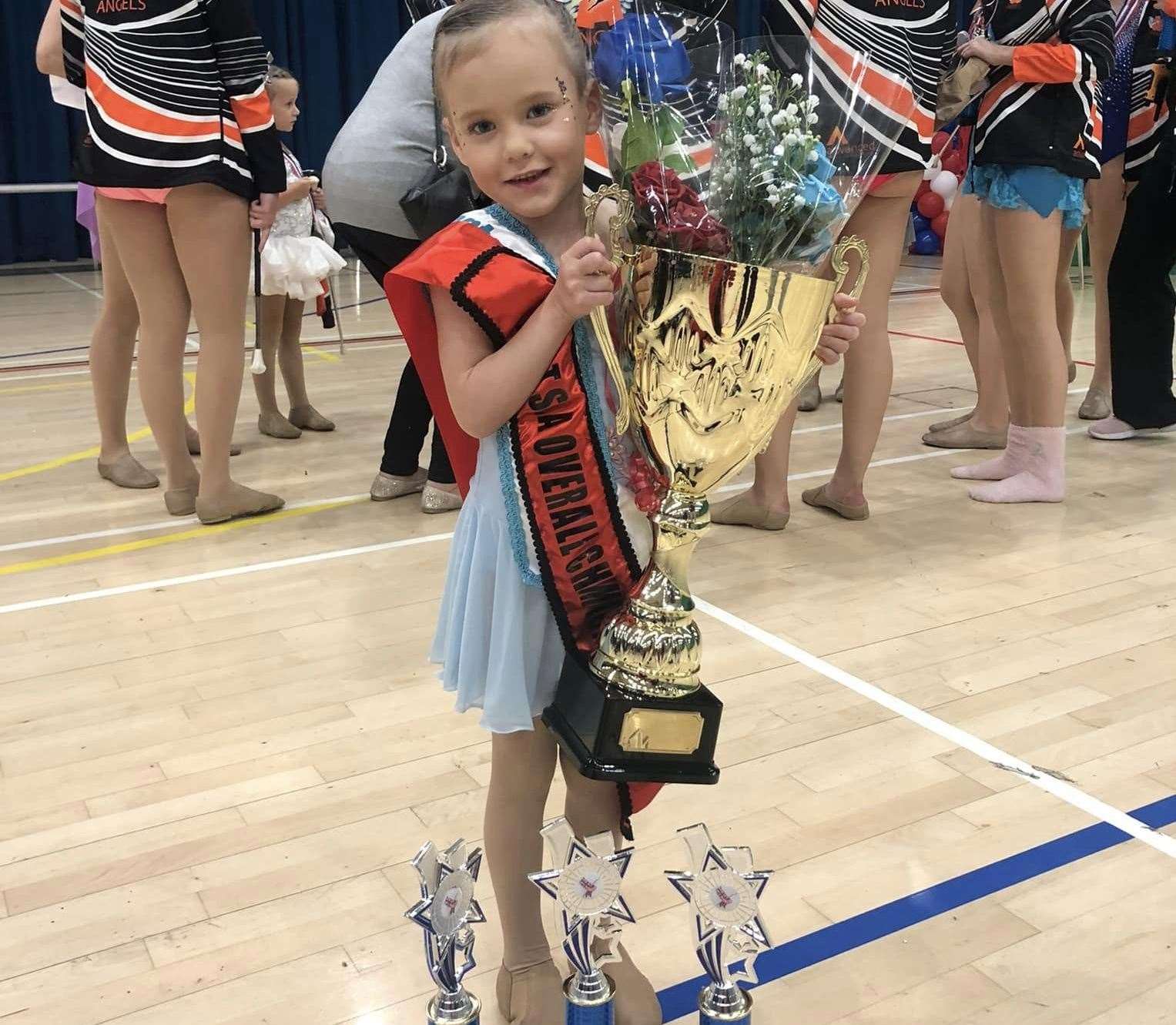 Aaliyah Ord with her trophy