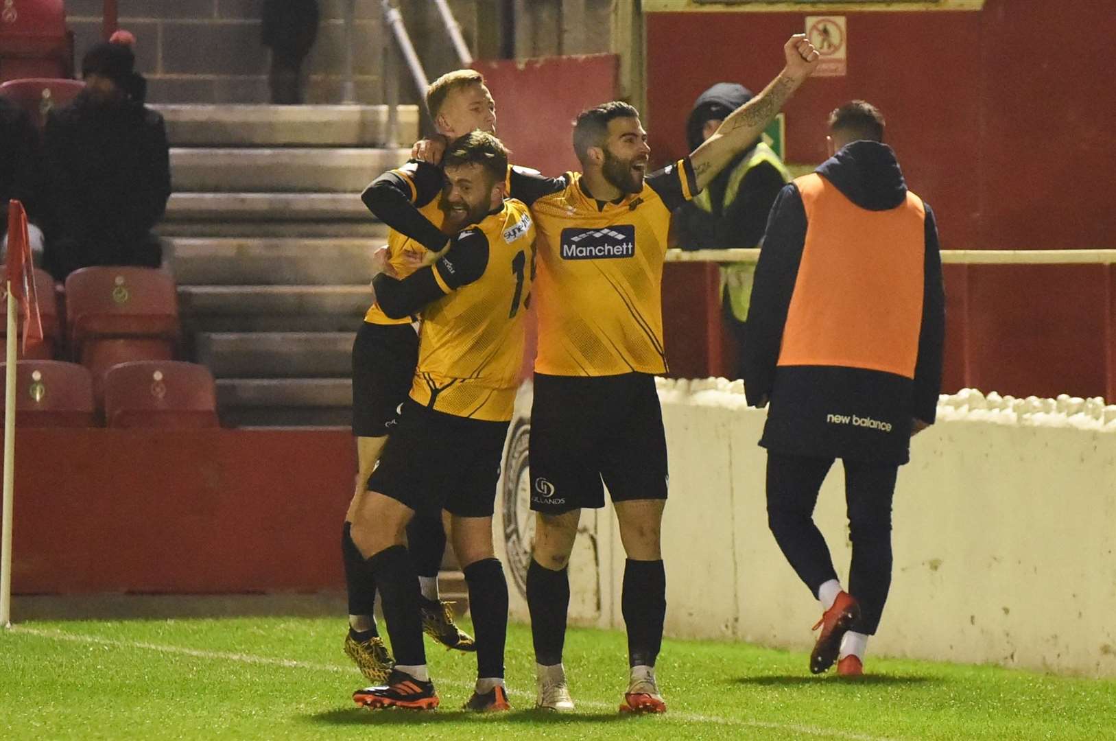 Sam Corne celebrates his winner with Regan Booty and Joan Luque Picture: Steve Terrell