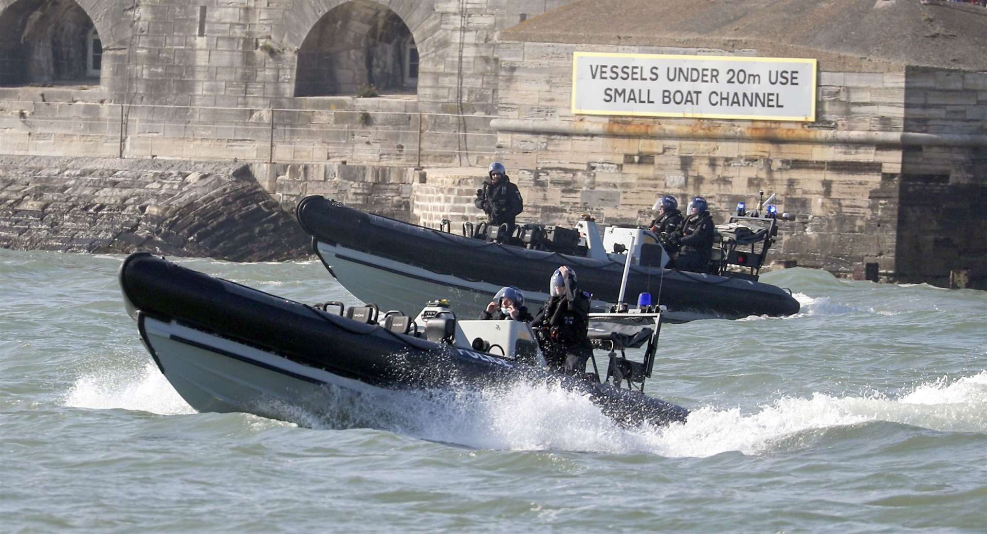 Police ribs escort HMS Queen Elizabeth (Steve Parsons/PA)