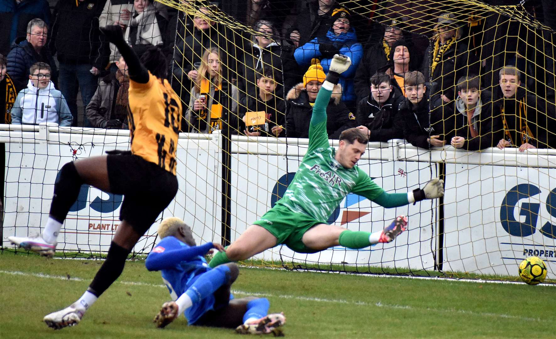 Evans Kouassi strikes past Wingate & Finchley keeper Charlie Grainger to put Folkestone into an early lead. Picture: Randolph File