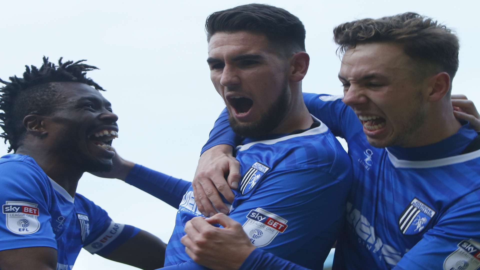 Conor Wilkinson congratulated on his late leveller Picture: Andy Jones