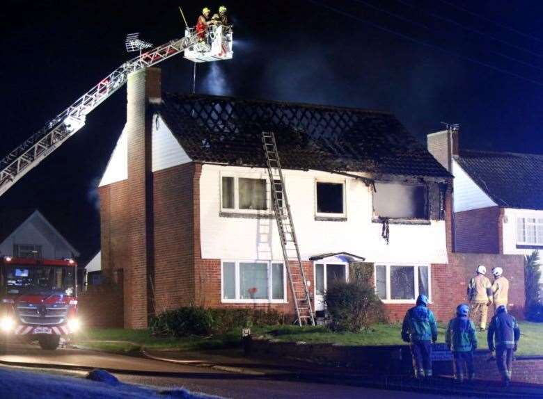 Firefighters dealing with the blaze at the house in Mereworth. Picture: UKNIP