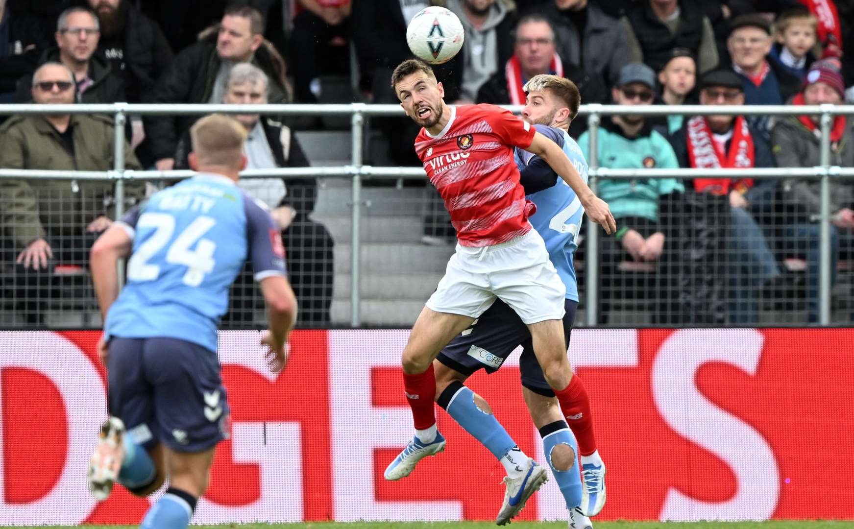 Greg Cundle wins the ball in the air during Ebbsfleet's FA Cup Second Round defeat. Picture: Keith Gillard