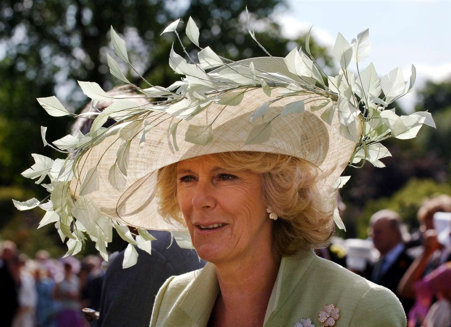 Camilla wearing a hat by milliner Philip Treacy (Fiona Hanson/PA)