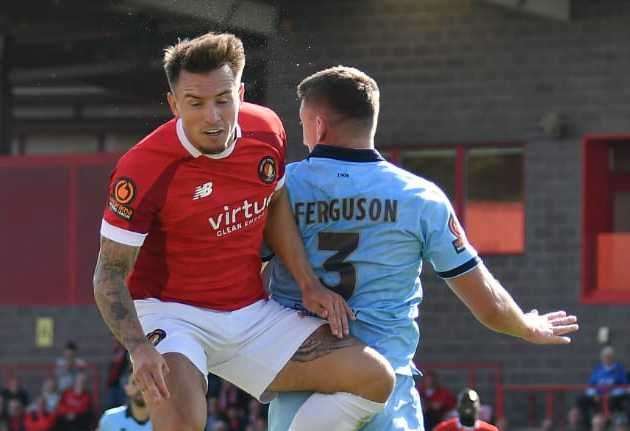 Ebbsfleet's Ben Chapman challenges Hartlepool's David Ferguson on Saturday. Picture: Ed Miller/EUFC