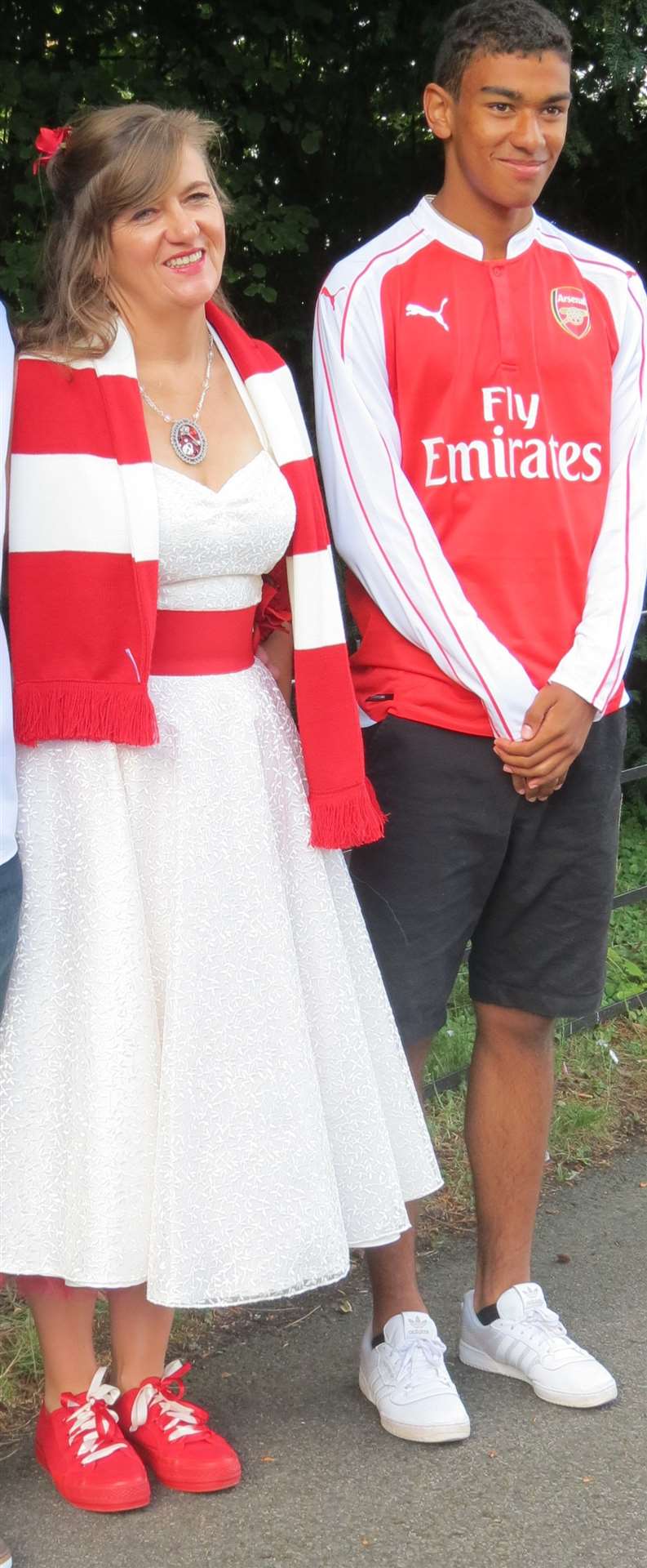 Vanessa Finch, from Margate, and her son at her wedding. She has won a prize as football team Arsenal's most avid fan.