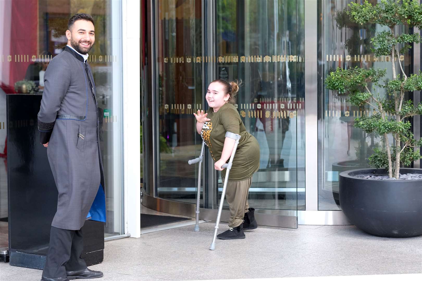 Angel outside the Shard with the building's doorman