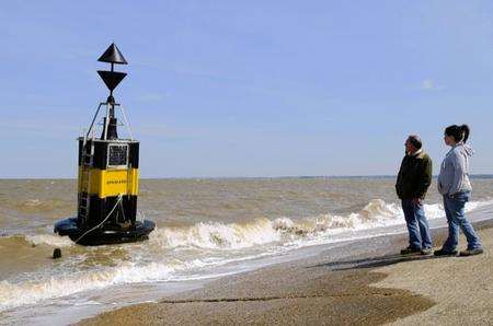 Shellness residents Alf Packman and Nicky Frewin made a discovery on the beach when they found the Spaniard Buoy beached on the sea defences