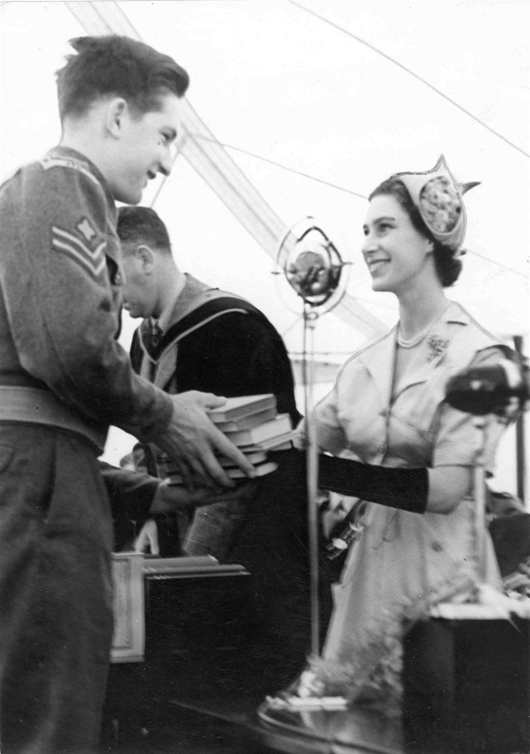 Princess Margaret presents Latin, Greek, English and Natural History prizes to J M Taylor at St Edmund's School