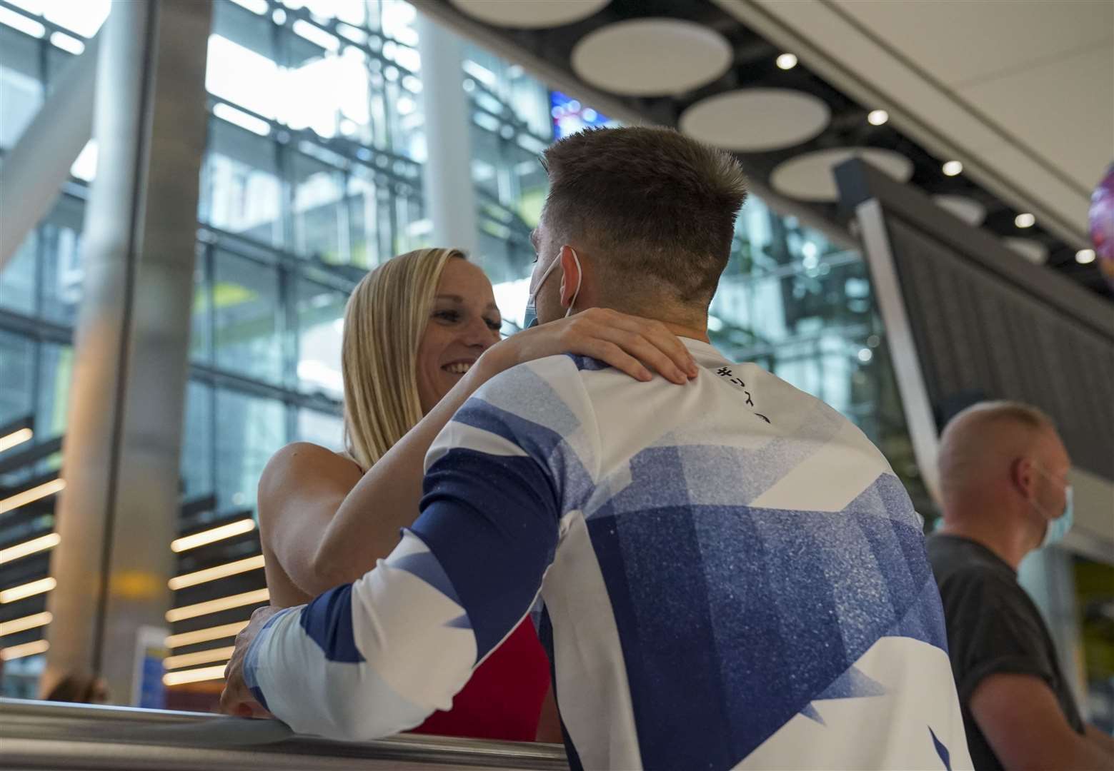 Max Whitlock hugs his wife Leah (Steve Parsons/PA)