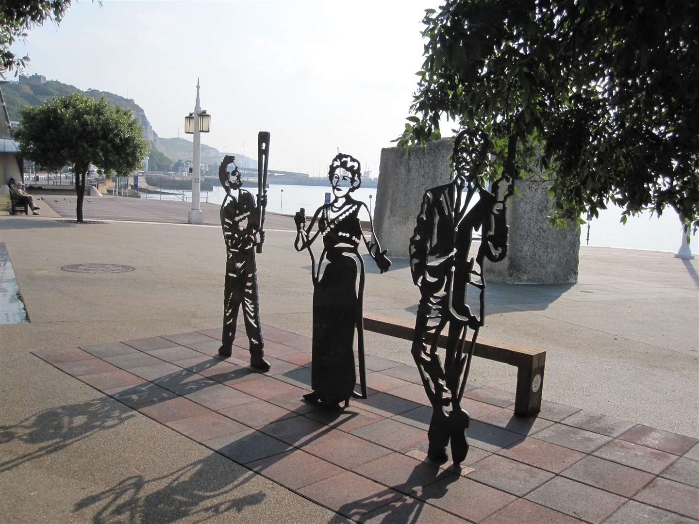 The three figures with the Portrait bench are Jamie Clark, Dame Vera Lynn and Bond writer Ian Fleming