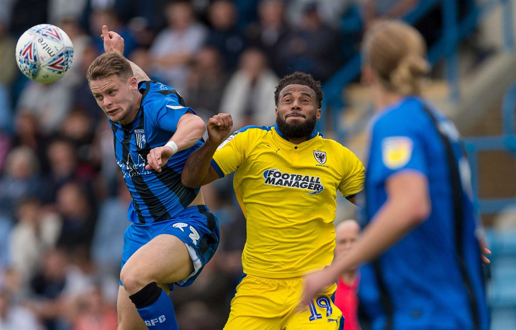 Gills' Mark Byrne challenges with Tom Soares Picture: Ady Kerry