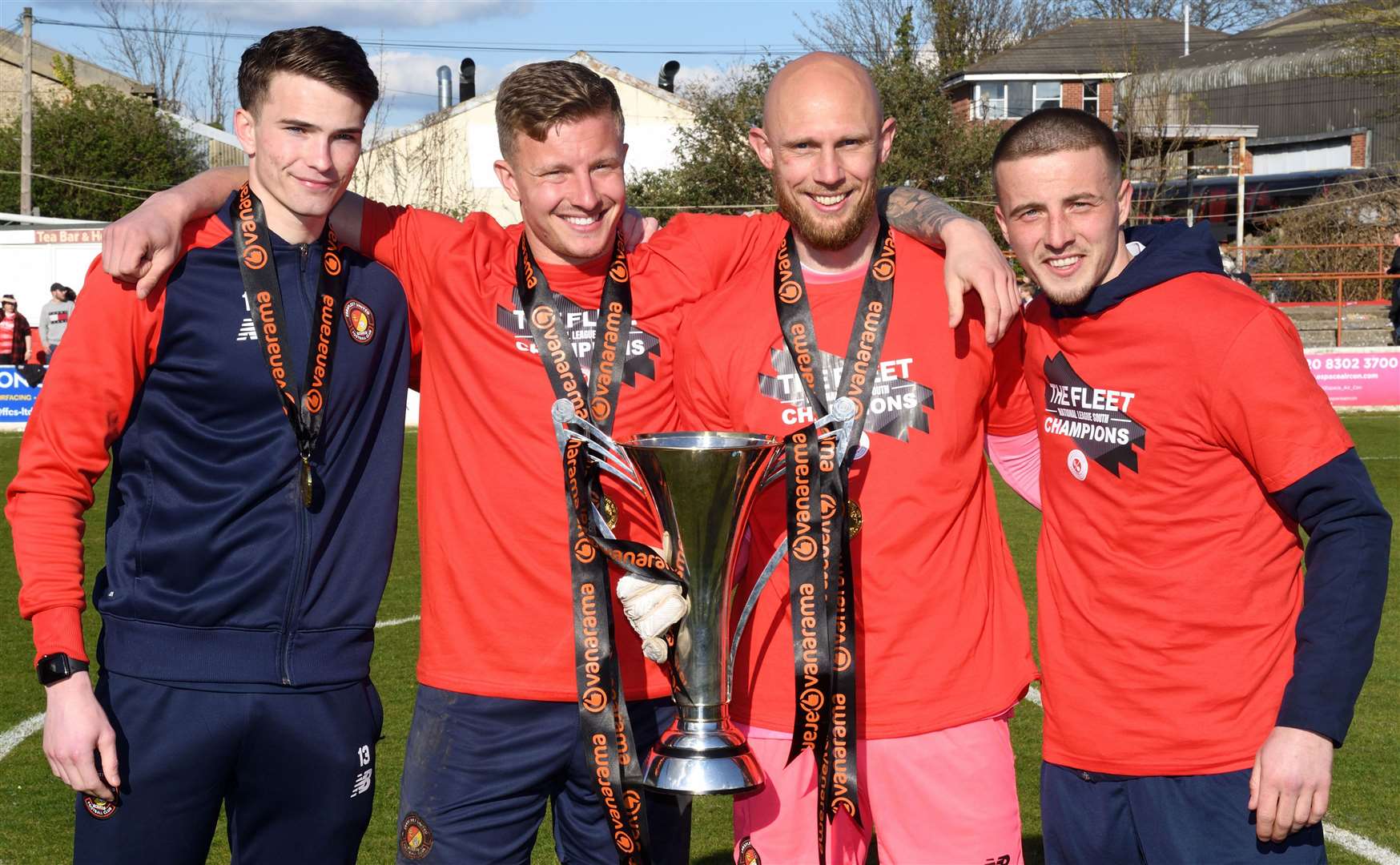 Chris Haigh, second left, is all smiles with the National League South trophy alongside fellow Ebbsfleet goalkeepers Harrison Firth and Mark Cousins plus goalkeeper coach Jeff Richardson. Picture: Simon Hildrew