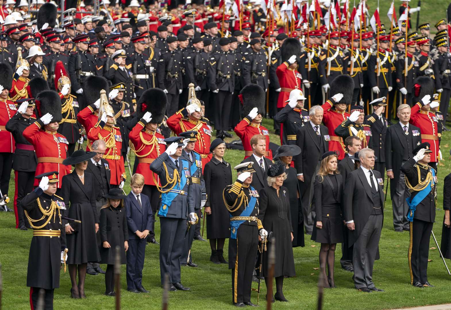 The King salutes as the State Gun Carriage carrying the coffin of his mother arrives at Wellington Arch (Jane Barlow/PA)