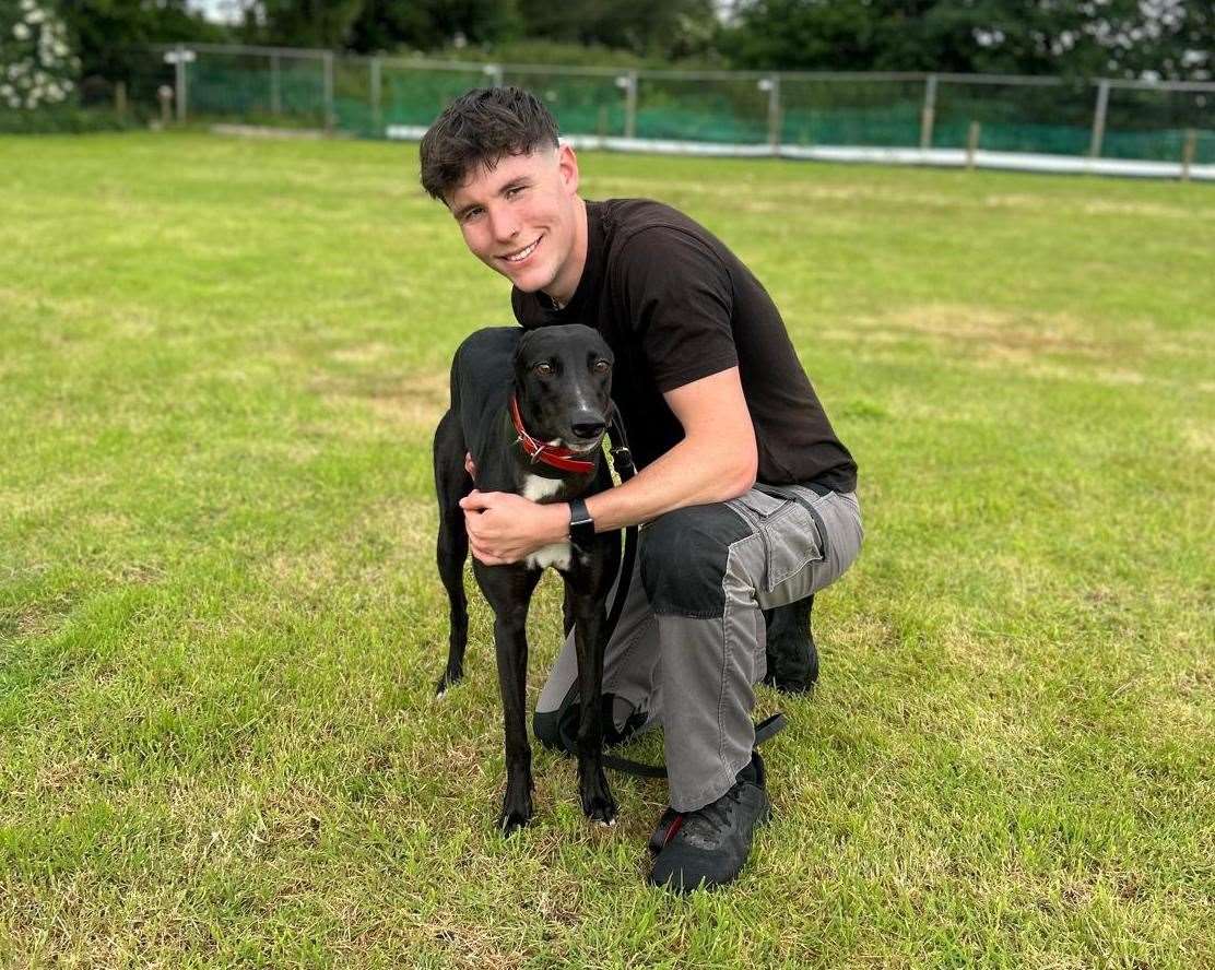 Killuran Bella, pictured with kennelhand Tyler Raby, will run from trap two in this Saturday's final of the 2024 Arena Racing Company Kent Silver Salver. Picture: Dan Brabon