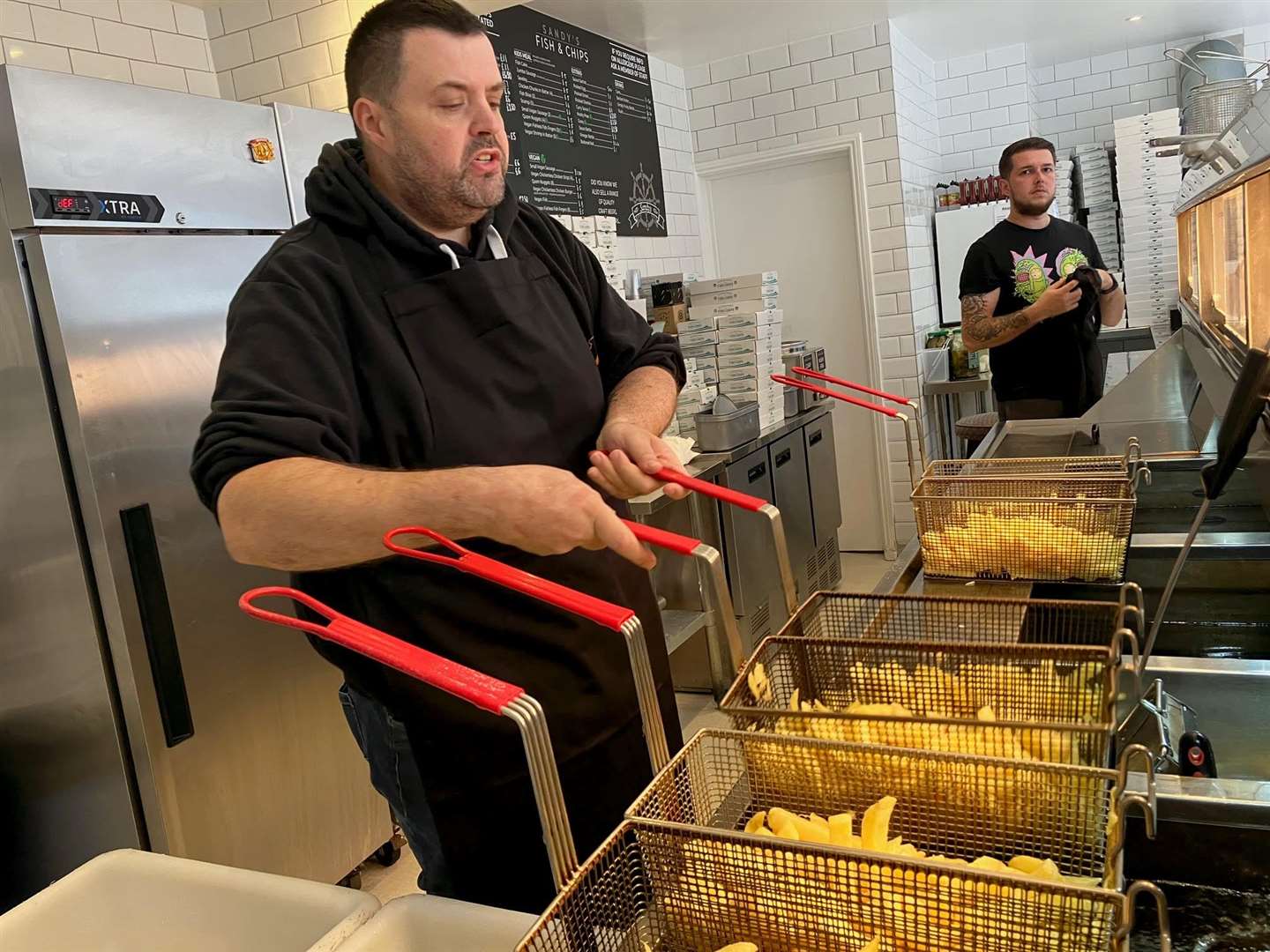 Andy Burnett at work at Sandy's Fish and Chips. Photo: KMG/LDRS