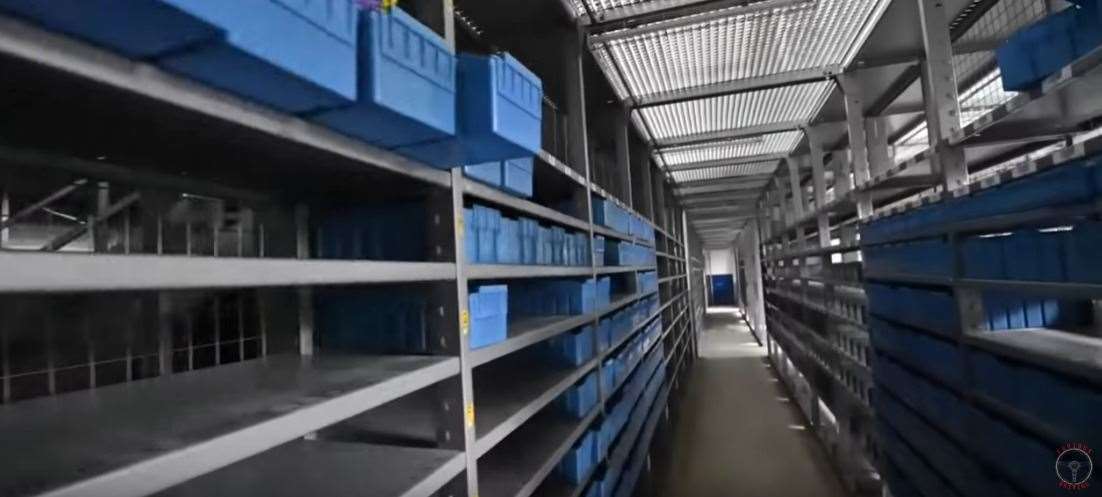 The store room is still filled with lengths of metal racking