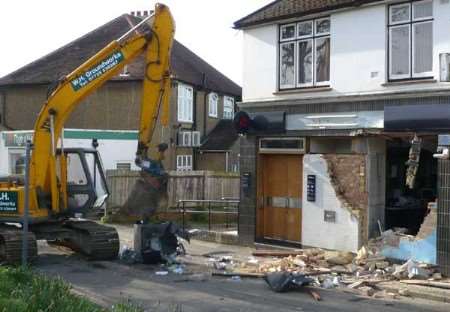 Scene of destruction: the outside of the bank on Friday. Pictures: Mary Graham