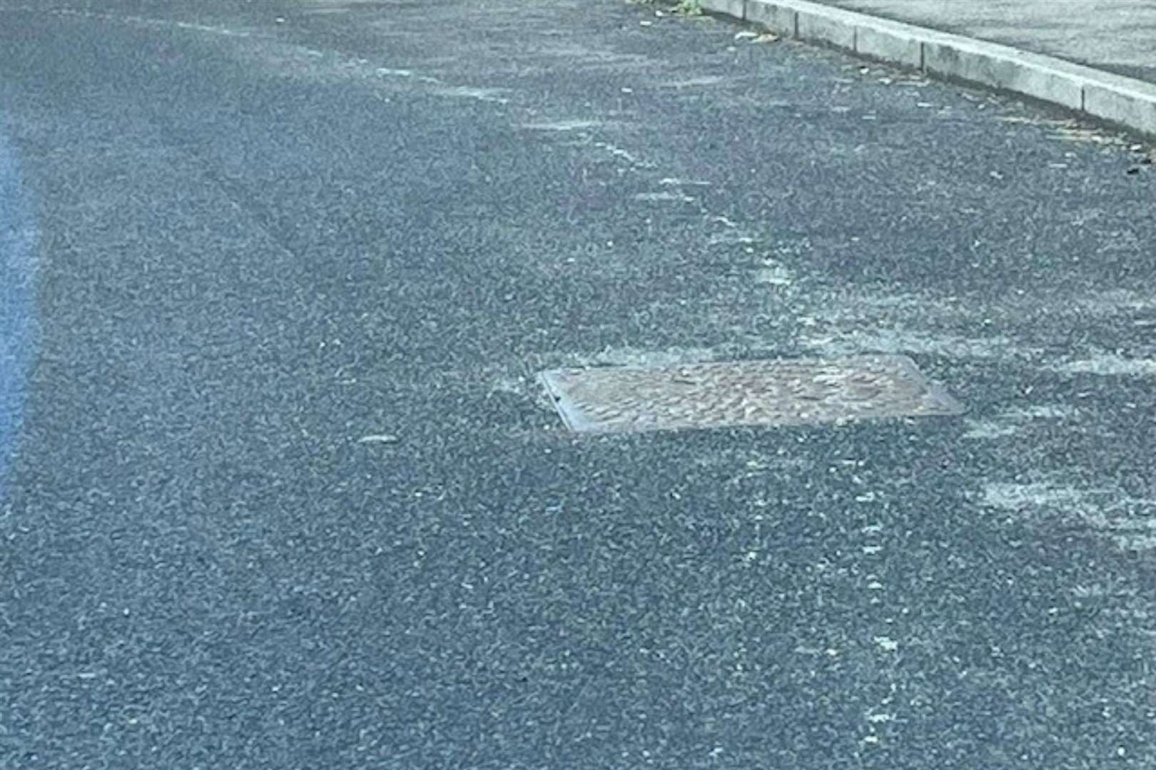 A long streak of paint was left on the road in Singleton. Photo: Ashford council