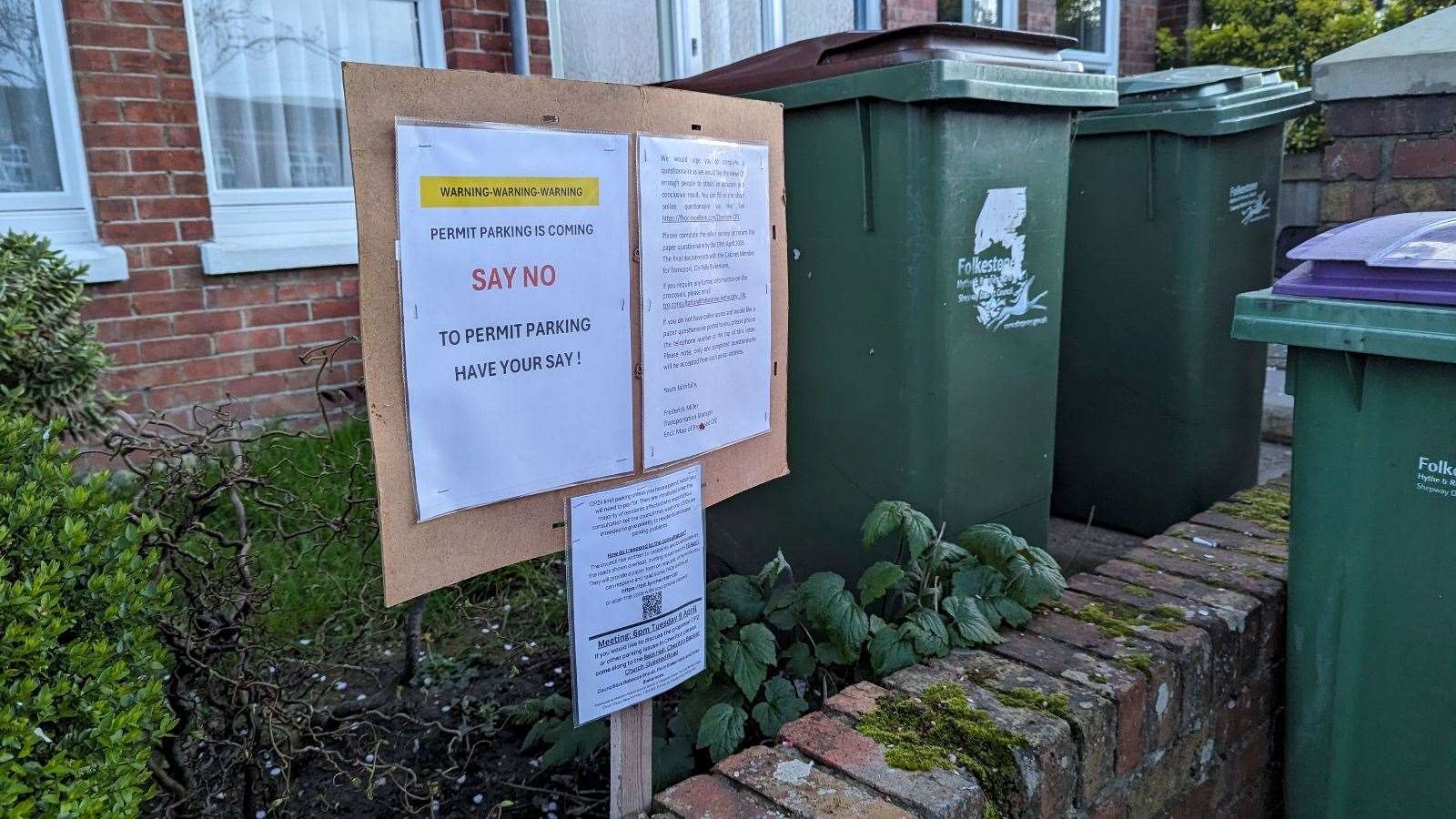 A sign has been put up in a garden in Cheriton