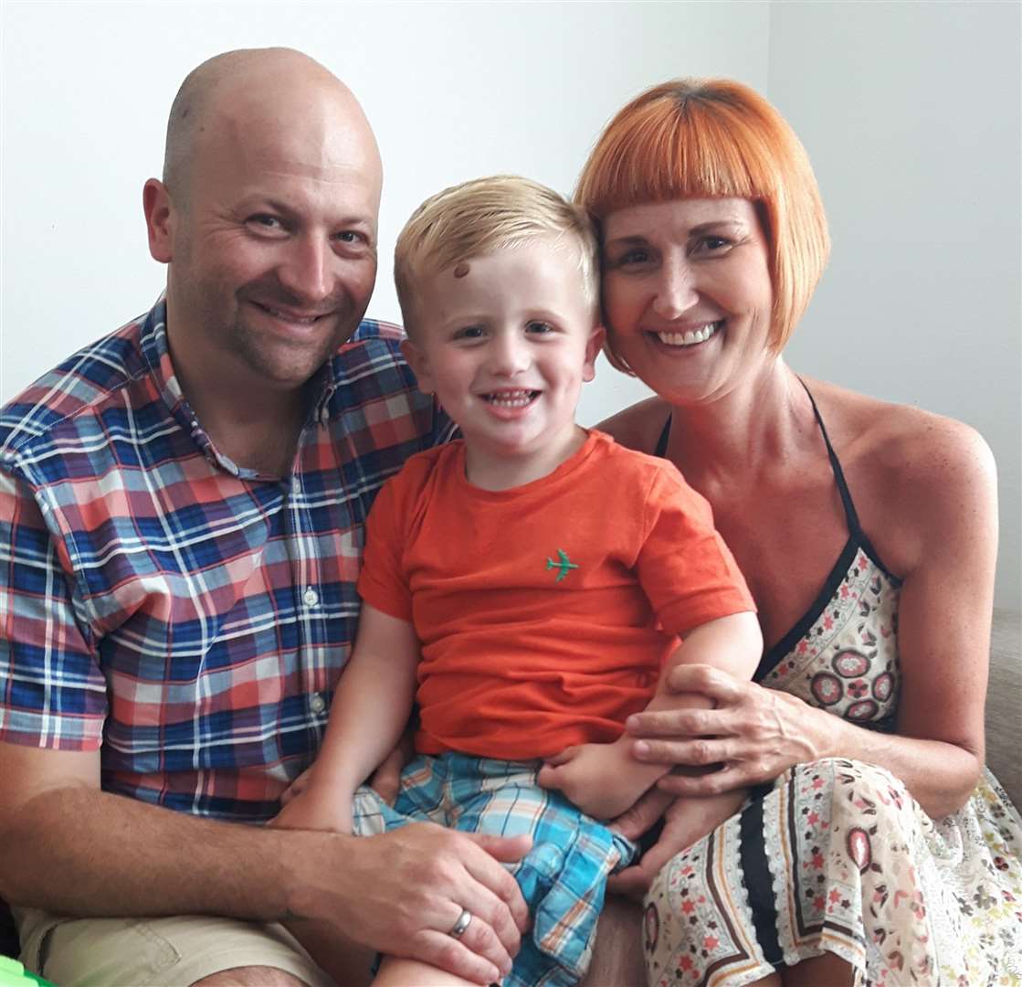 Digby Donnelly with his dad Steve and mum Lisa