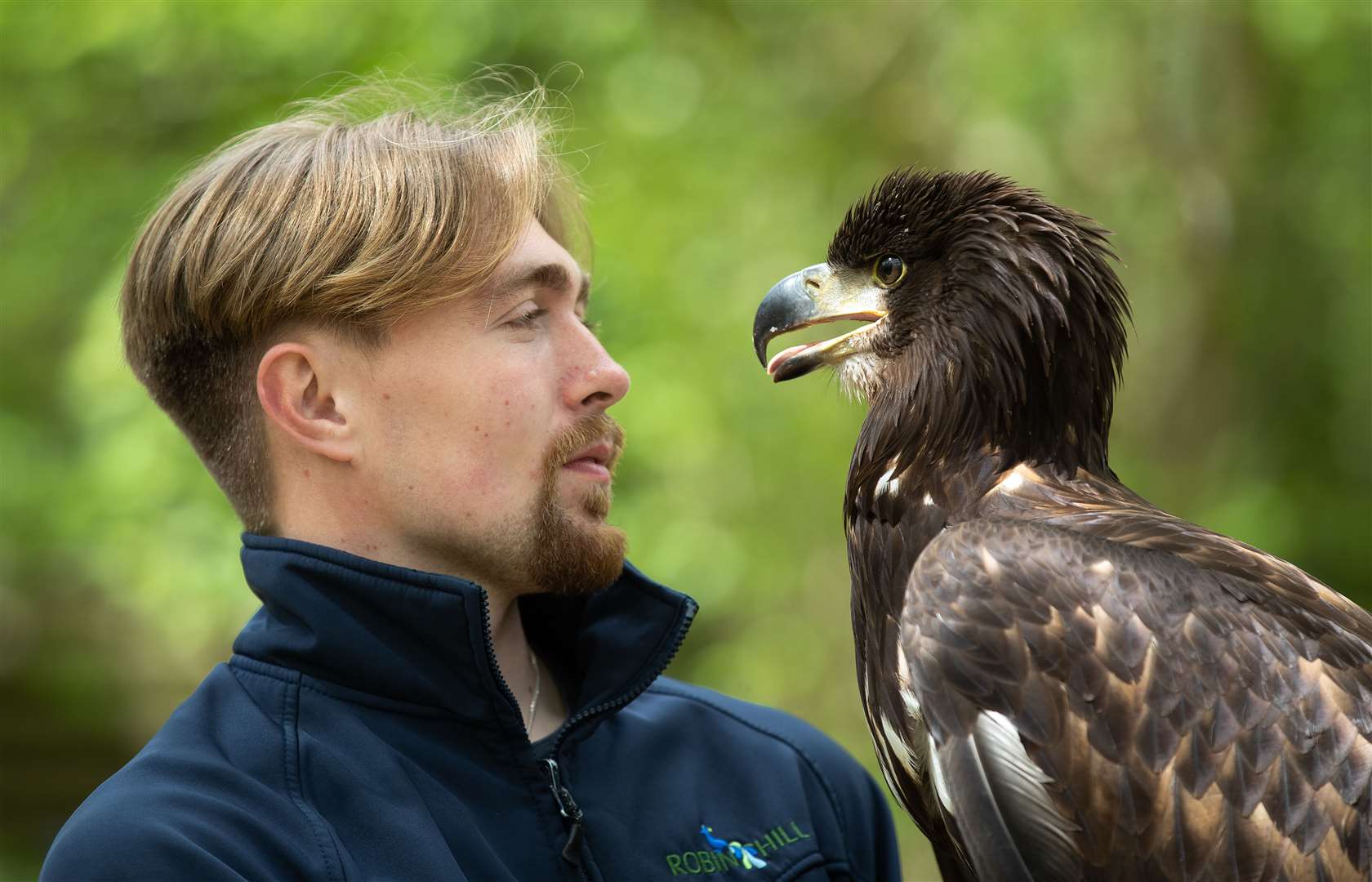 Charlie Rolle with 10-month-old white-tailed sea eagle Chief (Andrew Matthews/PA)