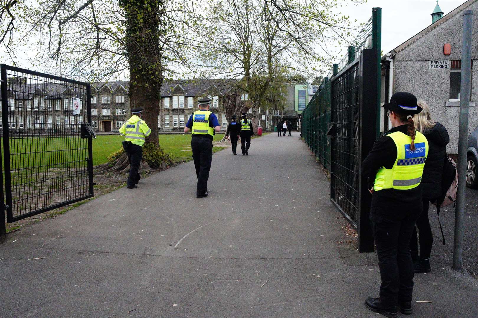 Police officers outside Amman Valley School in Ammanford, Carmarthenshire, in April (Ben Birchall/PA)