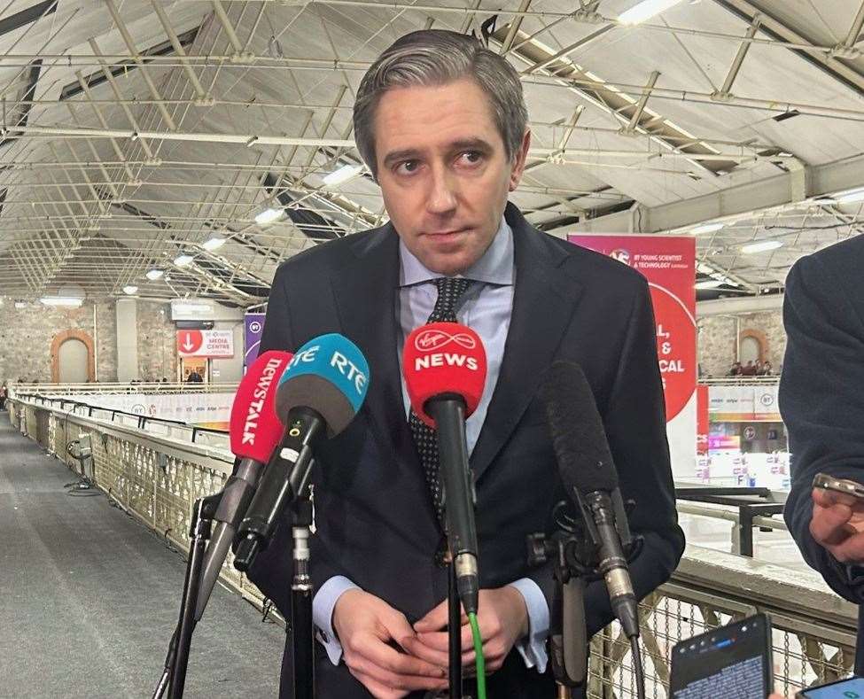 Taoiseach and Fine Gael leader Simon Harris speaking to the media at the BT Young Scientist and Technology Exhibition at the RDS in Dublin on Thursday. (Cillian Sherlock/PA)