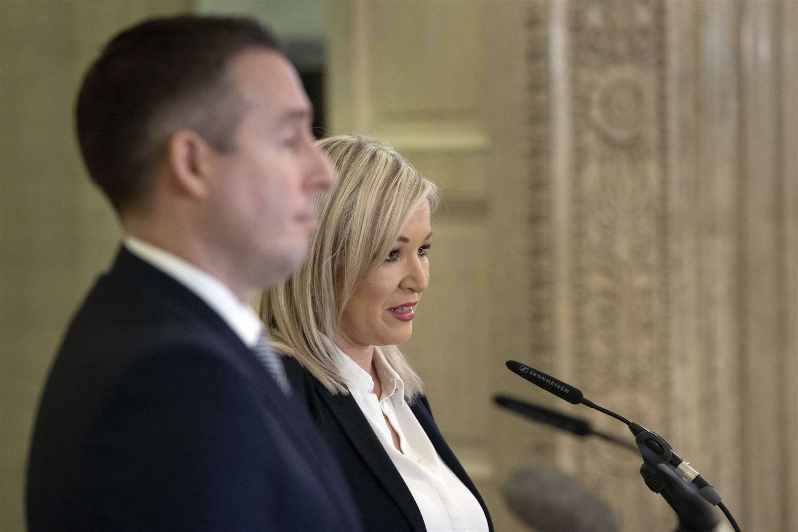 Former deputy first minister Michelle O’Neill and former first minister Paul Givan (left) in the Great Hall of Parliament Buildings at Stormont (Liam McBurney/PA)