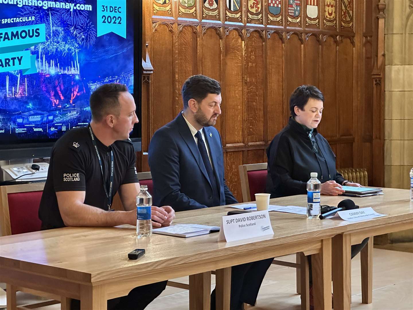 Superintendent David Robertson, left, Edinburgh council leader Cammy Day, and Penny Dougherty of Unique Assembly, give a press conference ahead of Edinburgh’s Hogmanay (Dan Barker/PA)