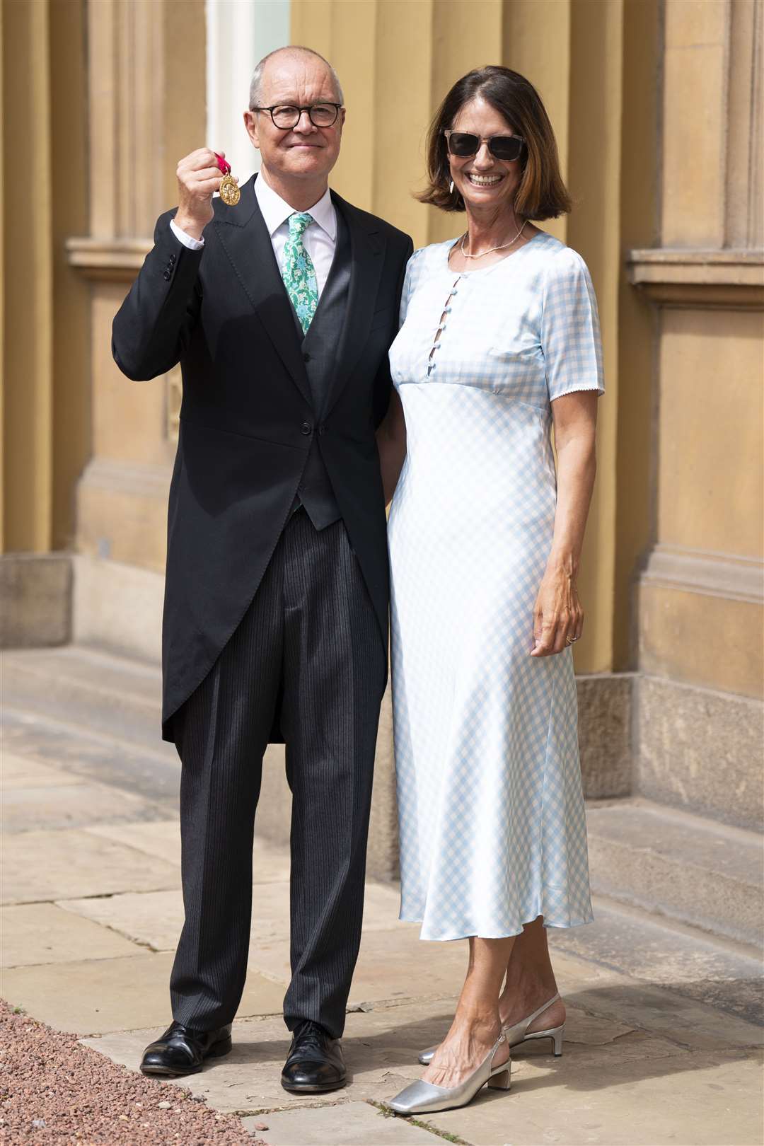 Sir Patrick Vallance after he was made a Knight Commander, with his wife Sophie Dexter (Kirsty O’Connor/PA)