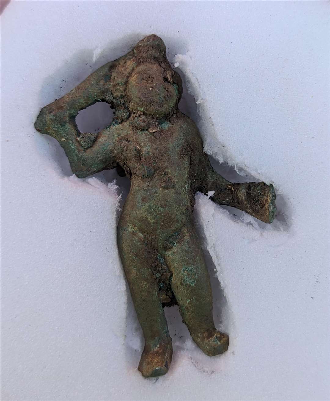 A 2,000-year-old Cupid figurine which was found among Roman artefacts on a stretch of the new A417 Missing Link route in Gloucestershire (Highways England/PA)