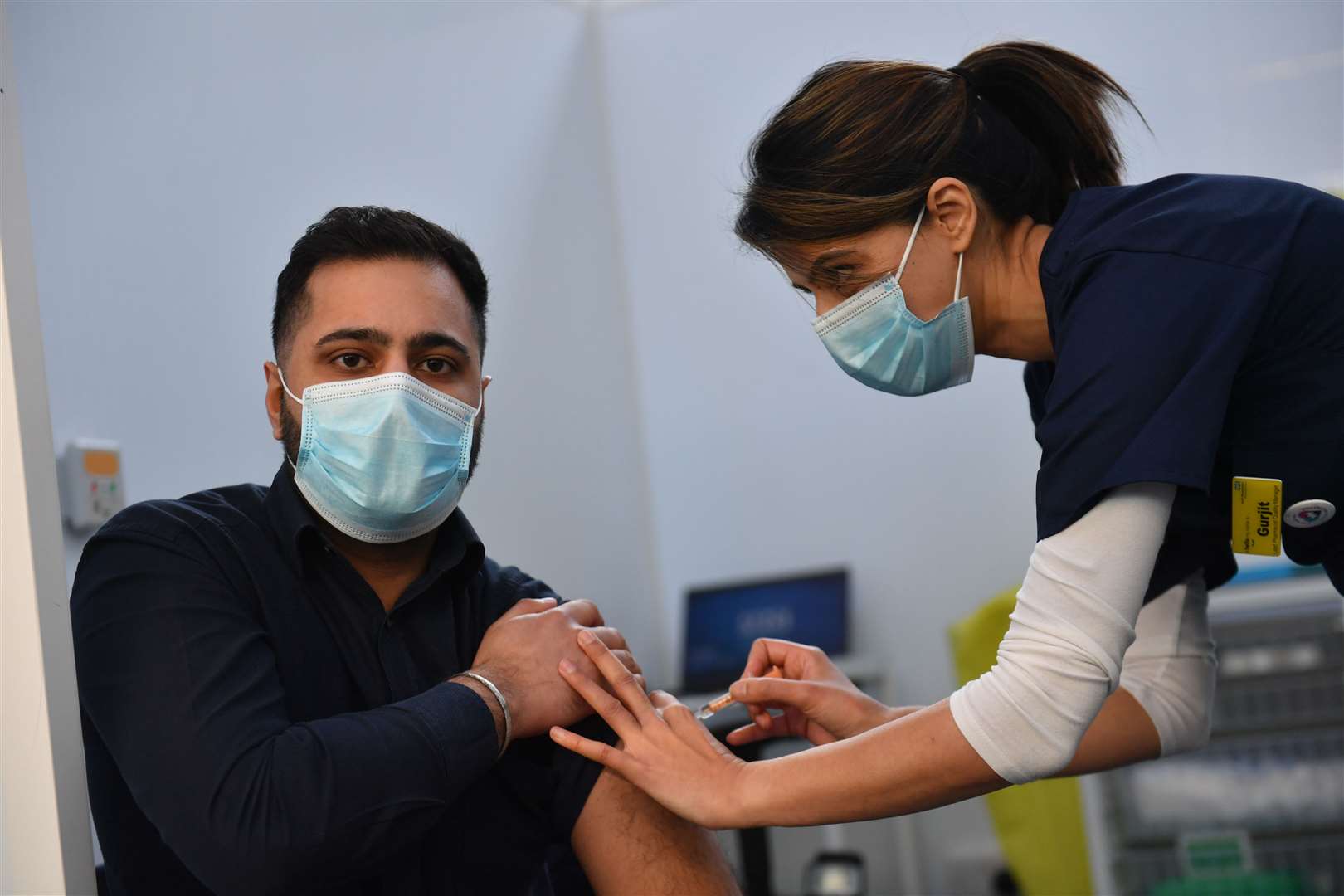 A man receives a coronavirus vaccination (Jacob King/PA)