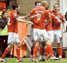 Charlton players celebrate their second goal scored by Hogan Ephraim