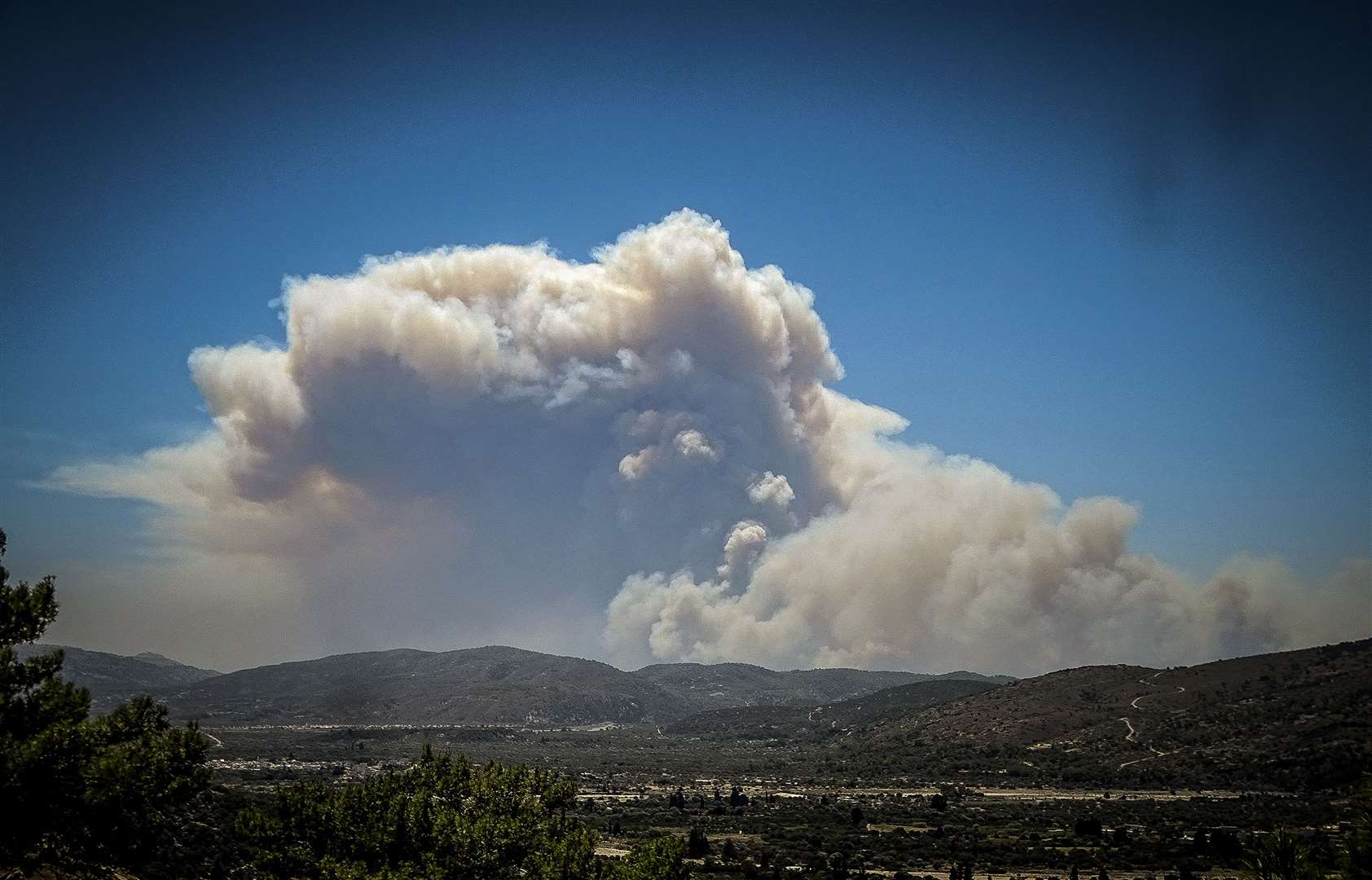 A wildfire in Rhodes is burning for a sixth day (Argyris Mantikos/AP)