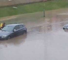 Floodwaters in West Kingsdown. Picture by Mel Ball (24761011)