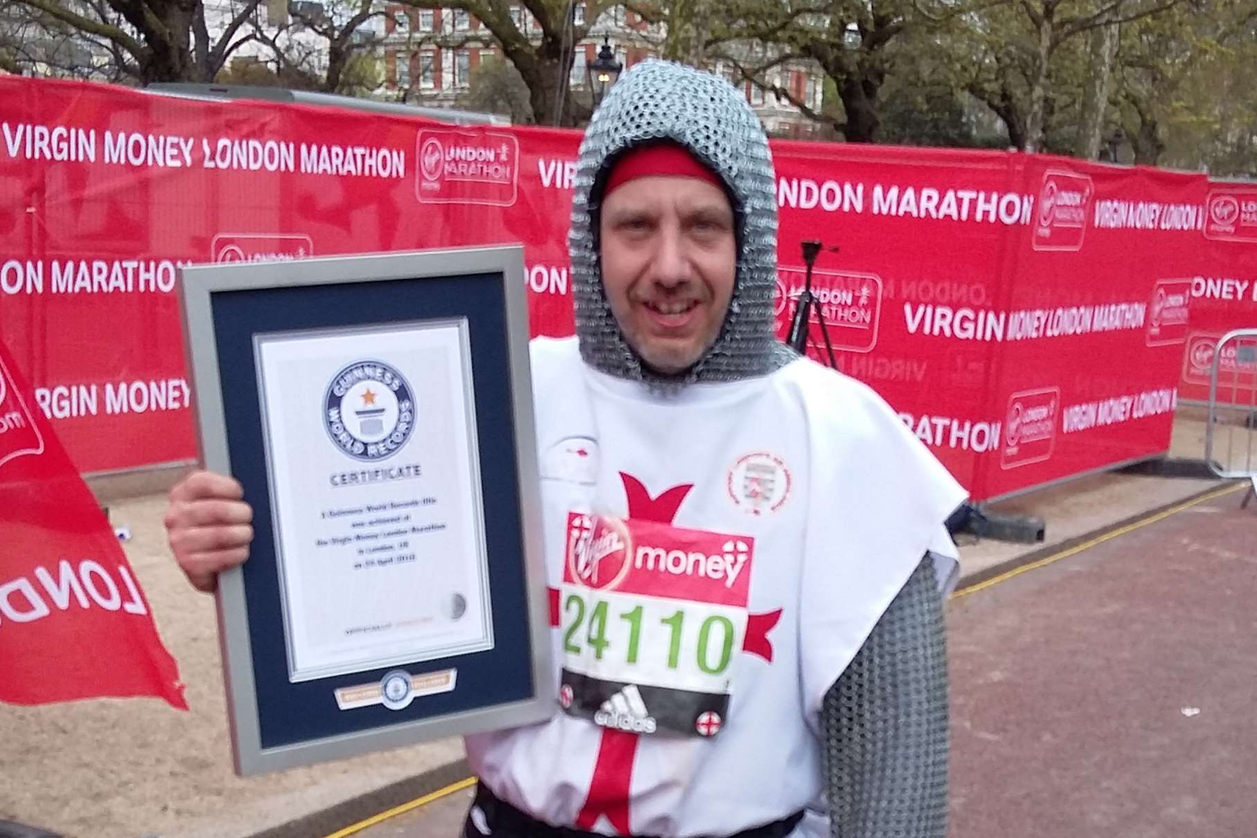 David Cooke, broke the Guinness World Record by running the London Marathon in chainmail