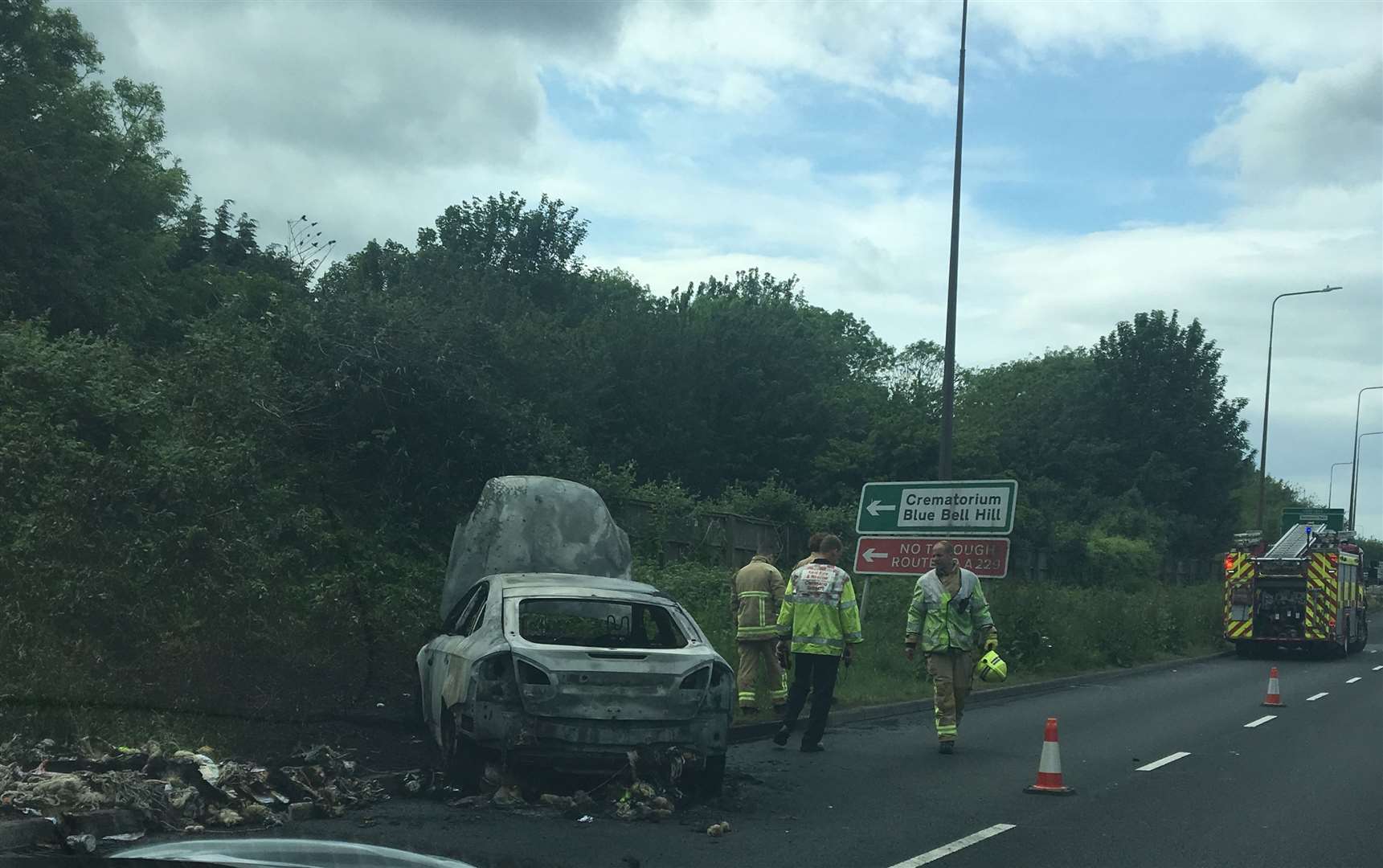 The car has been moved to the edge of the road