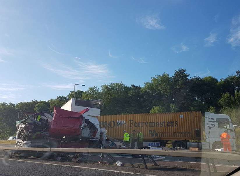 The mangled wreckage of one of the lorries. Picture: @Kent_999s