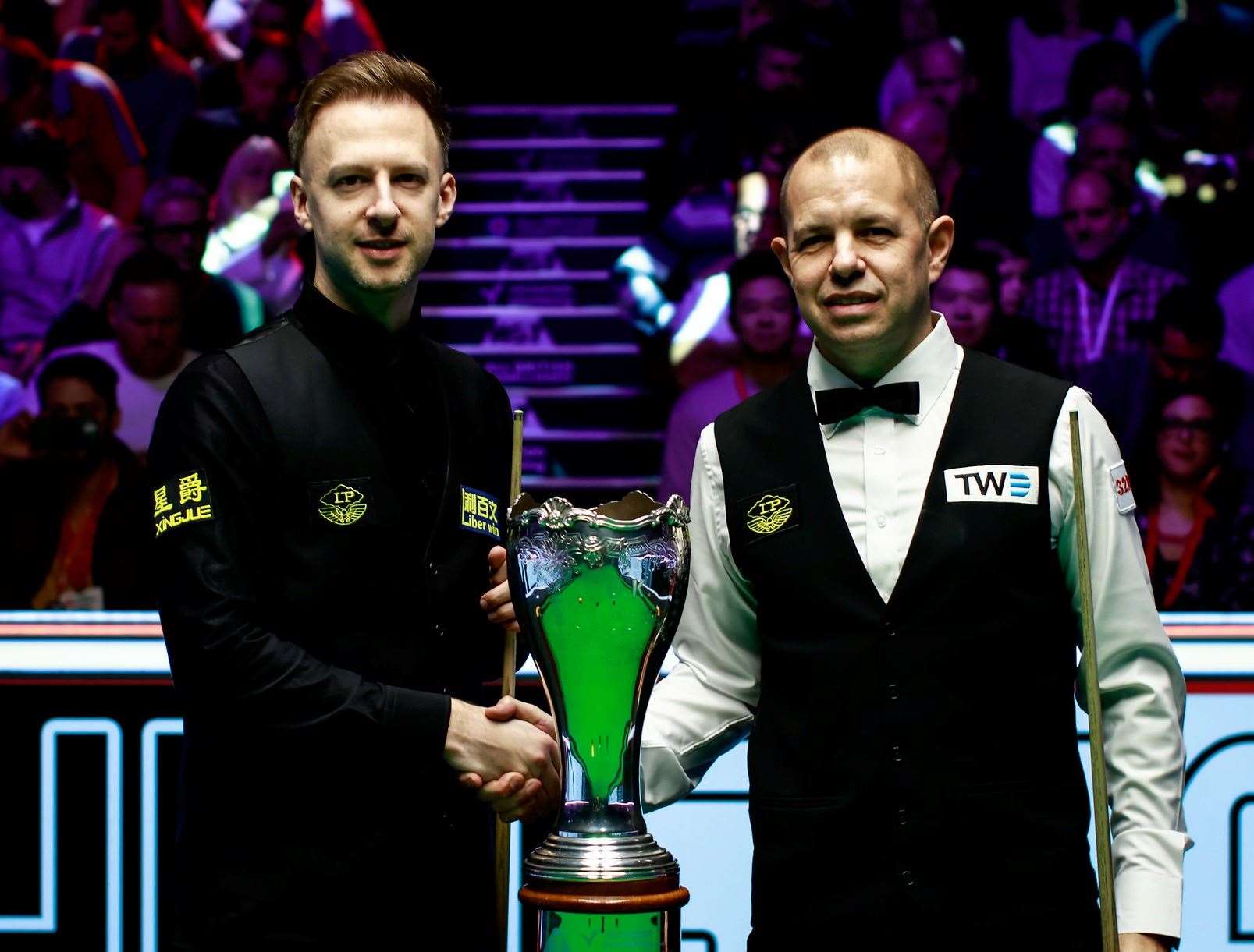 Ditton's Barry Hawkins, right, and Judd Trump shake hands before the UK Championship final at the Barbican. Picture: World Snooker