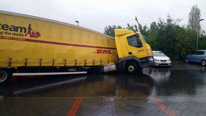 The lorry has fallen into a sink hole outside the Toby Carvery. Picture: Anna Allen (17401797)