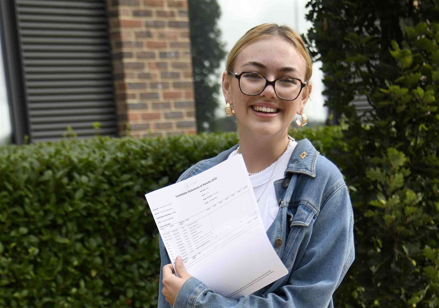 Summer Beames from St Augustine Academy in Maidstone achieved six grade 9s and 8s. She will now take up a scholarship at Sutton Valence School