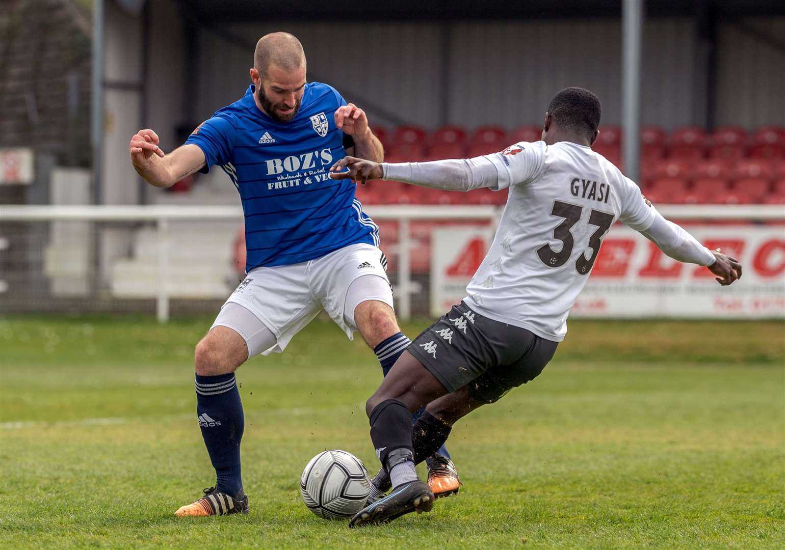 Dover frontman Michael Gyasi gets stuck in during the home defeat to Woking on Monday. Picture: Stuart Brock