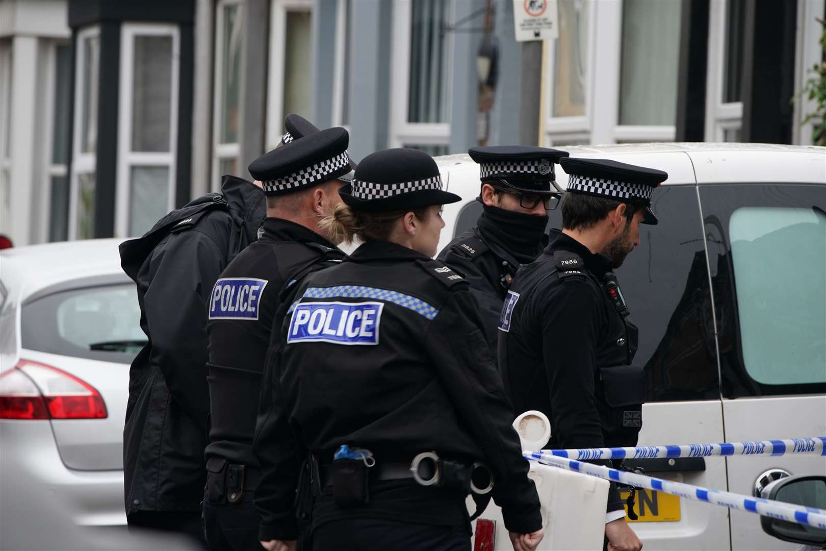 Police in Sutcliffe Street (Peter Byrne/PA)