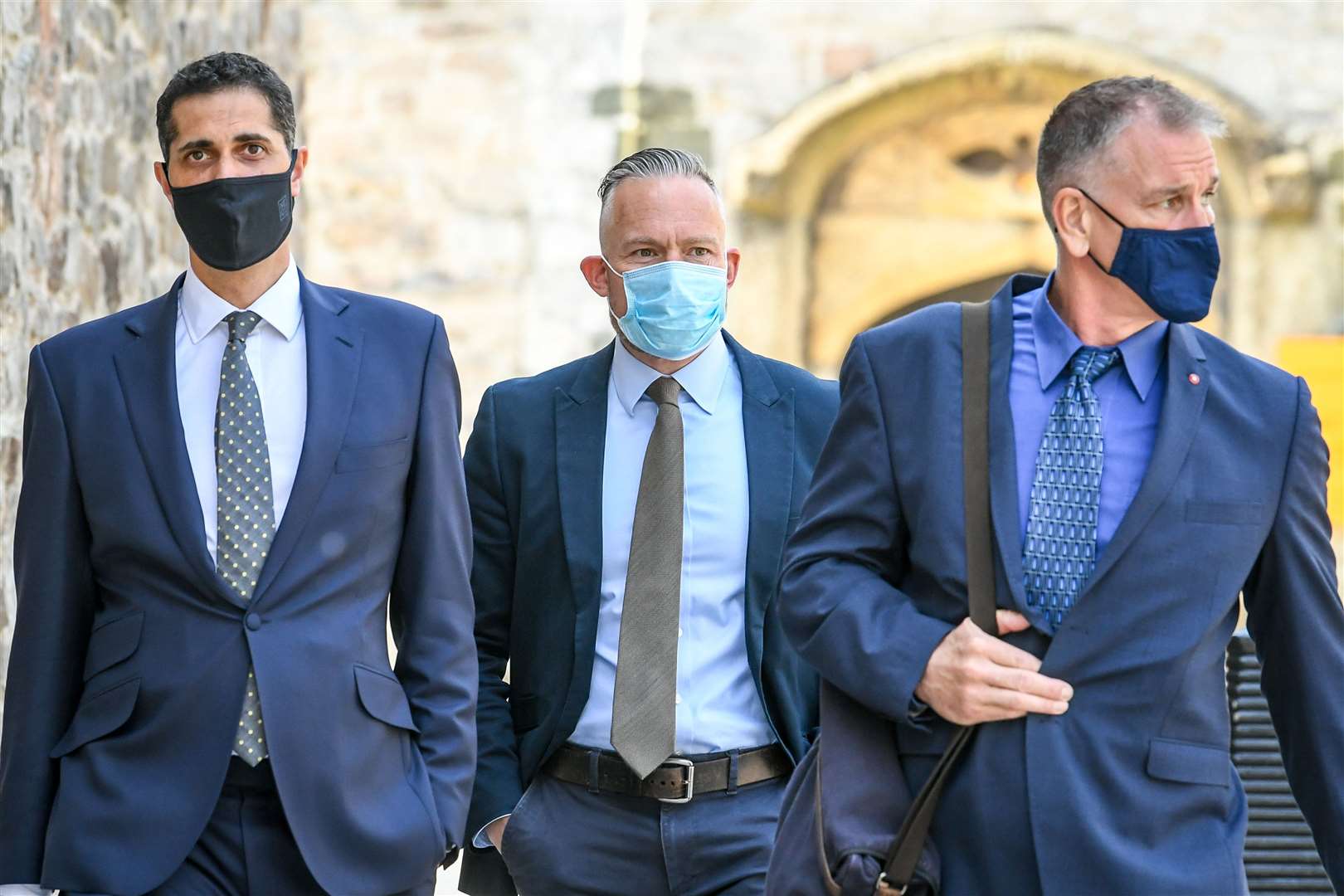 Sergeant Geraint Jones, centre, arrives at Plymouth Magistrates’ Court for his trial (Ben Birchall/PA)